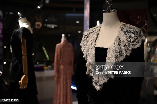 Photo taken on April 17, 2024 shows outfits once worn by Princess Diana at a media preview ahead of the auction by Julian's Auctions titled "Princess...