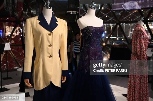 Photo taken on April 17, 2024 shows outfits once worn by Princess Diana at a media preview ahead of the auction by Julian's Auctions titled "Princess...