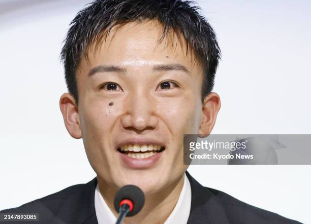 Former badminton world champion Kento Momota speaks during a press conference on his retirement from playing for the Japanese national team on April...