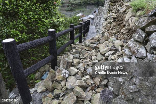 Photo shows a partially collapsed stone wall in Ainan in Ehime Prefecture, western Japan, on April 18 after an earthquake with a magnitude of 6.6 hit...