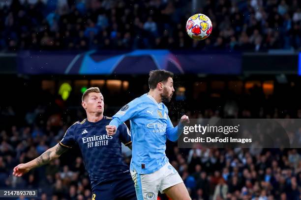 Toni Kroos of Real Madrid and Bernardo Silva of Manchester City battle for the ball during the UEFA Champions League quarter-final second leg match...