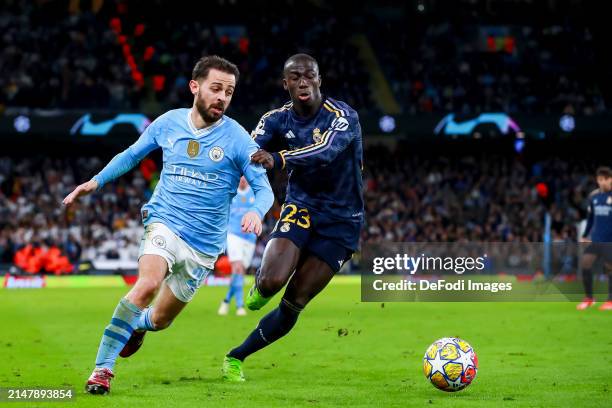 Bernardo Silva of Manchester City and Ferland Mendy of Real Madrid battle for the ball during the UEFA Champions League quarter-final second leg...