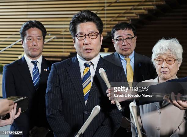 Takuya Yokota , head of a group representing the families of Japanese nationals abducted by North Korea, speaks to reporters following a meeting with...