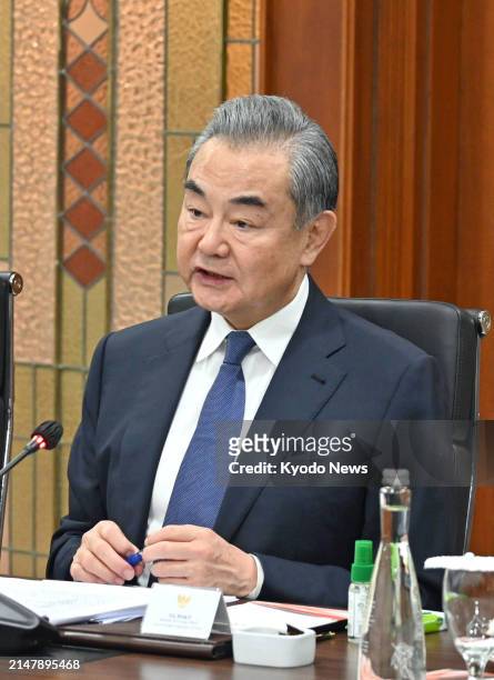 Chinese Foreign Minister Wang Yi is pictured before talks with his Indonesian counterpart Retno Marsudi in Jakarta on April 18, 2024.