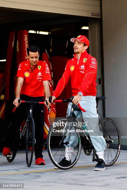 Charles Leclerc, Scuderia Ferrari, with a bicycle in the pit lane during previews ahead of the F1 Grand Prix of China at Shanghai International...