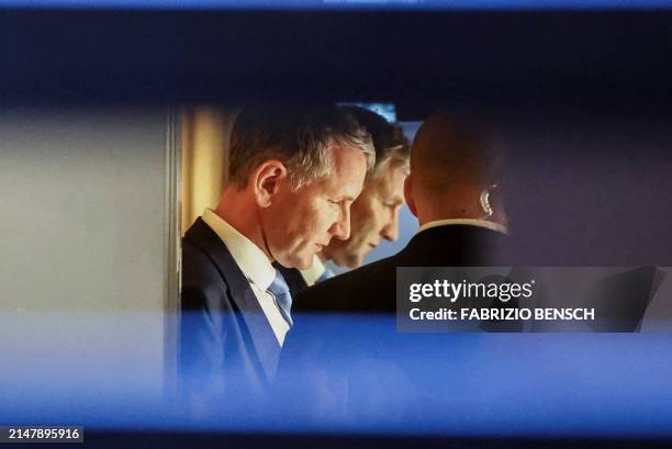 German far-right politician of the Alternative for Germany Bjoern Hoecke looks on in an elevator on the day of his trial over the alleged use of Nazi...