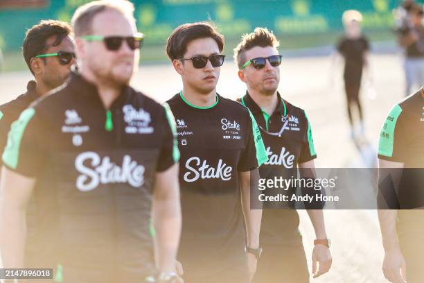 Zhou Guanyu, Stake F1 Team Kick Sauber, walks the track with his engineers during previews ahead of the F1 Grand Prix of China at Shanghai...