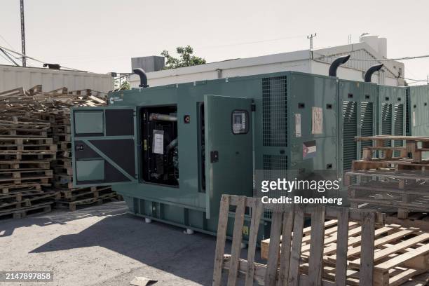 Donated generator awaits shipping to the Gaza Strip at a warehouse operated by the Jordan Hashemite Charity Organization in Amman, Jordan, on...