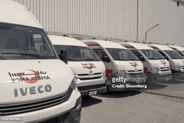 Ambulances await shipping to the Gaza Strip at a warehouse operated by the Jordan Hashemite Charity Organization in Amman, Jordan, on Wednesday,...