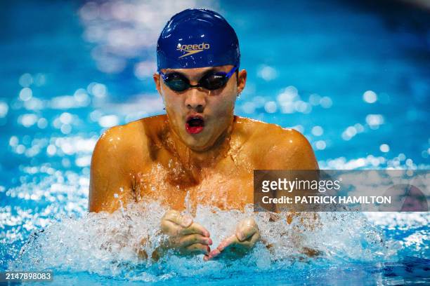 Hong Kong's Ching Hei Lai competes in the men's open 200m breaststroke event during the Australian Open Swimming Championships at the Gold Coast...