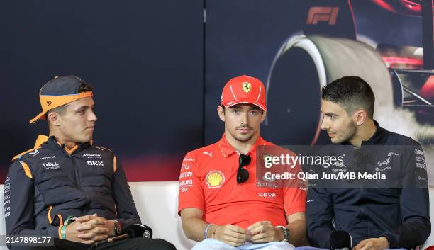 Lando Norris of Great Britain and McLaren F1 Team, Charles Leclerc of Monaco and Scuderia Ferrari and Esteban Ocon of France and BWT Alpine F1 Team...