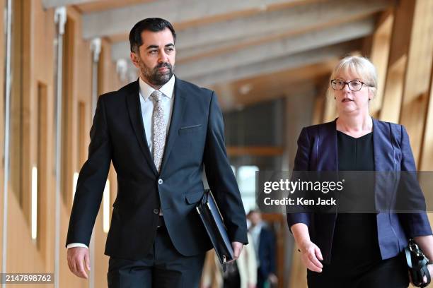 First Minister Humza Yousaf, on the way to First Minister's Questions in the Scottish Parliament, accompanied by his deputy Shona Robison, on April...