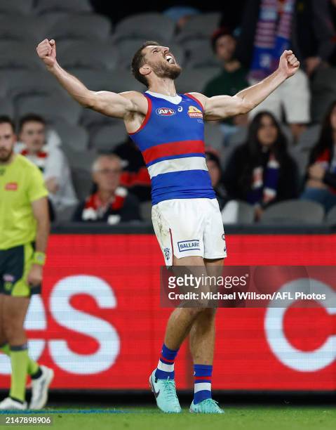 Marcus Bontempelli of the Bulldogs celebrates a goal during the 2024 AFL Round 06 match between the St Kilda Saints and the Western Bulldogs at...