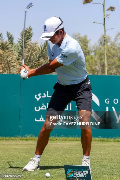 Hong Kong's Taichi Kho plays a shot during the Asian Tour Saudi Open golf tournament at the Riyadh Golf Club in Riyadh on April 18, 2024.