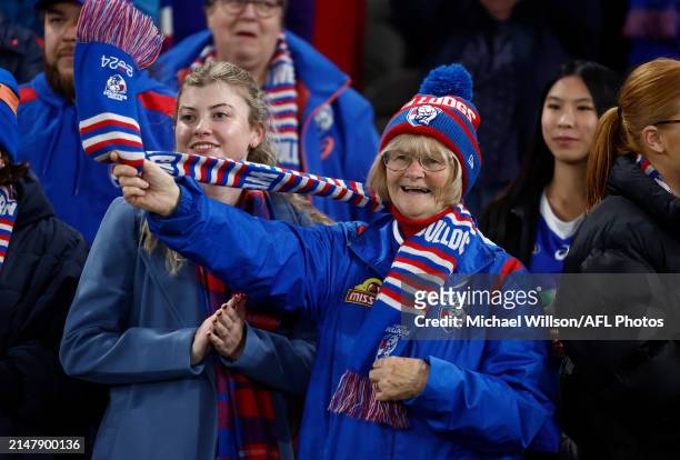 Bulldogs fans celebrate during the 2024 AFL Round 06 match between the St Kilda Saints and the Western Bulldogs at Marvel Stadium on April 18, 2024...