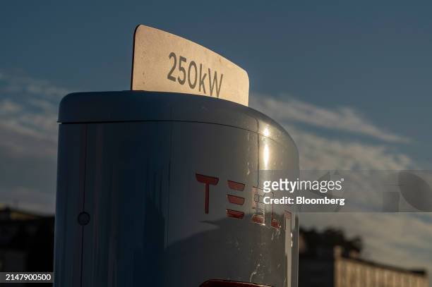 Tesla supercharging station in San Francisco, California, US, on Wednesday, April 17, 2024. Tesla Inc. Is slashing headcount by more than 10%, part...