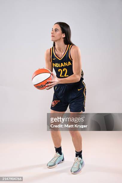 Caitlin Clark of the Indiana Fever poses for a portrait at Gainbridge Fieldhouse during her introductory press conference on April 17, 2024 at...