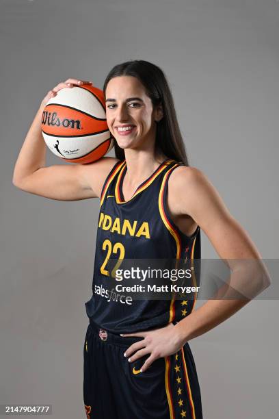 Caitlin Clark of the Indiana Fever poses for a portrait at Gainbridge Fieldhouse during her introductory press conference on April 17, 2024 at...