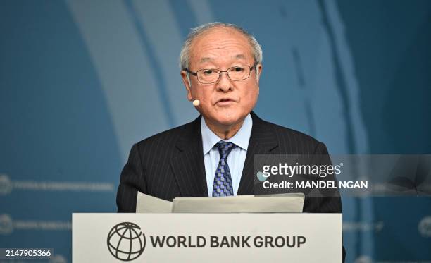 Japanese Finance Minister Shun'ichi Suzuki speaks during an event about expanding health coverage for all during the IMF-World Bank Group spring...