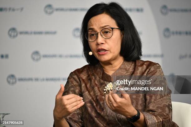 Indonesian Finance Minister Sri Mulyani Indrawati speaks during an event about expanding health coverage for all during the IMF-World Bank Group...