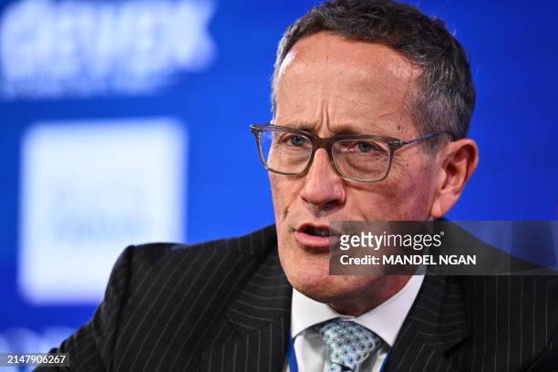 Journalist Richard Quest moderates a "Debate on the Global Economy" during the IMF-World Bank Group spring meetings at IMF headquarters in...