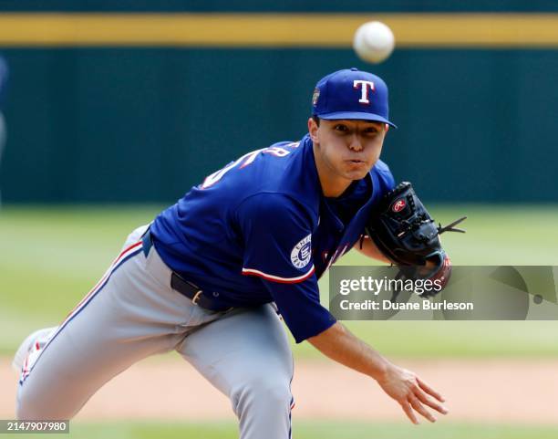 Jack Leiter of the Texas Rangers tosses a warmup pitch before the third inning of his MLB Debut against the Detroit Tigers at Comerica Park on April...