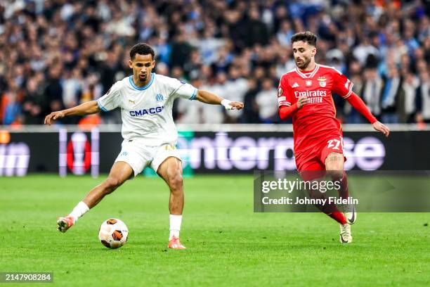 Iliman NDIAYE of Marseille and Rafa SILVA of Benfica during the UEFA Europa League Quarter-finals match between Marseille and Benfica at Oragne...