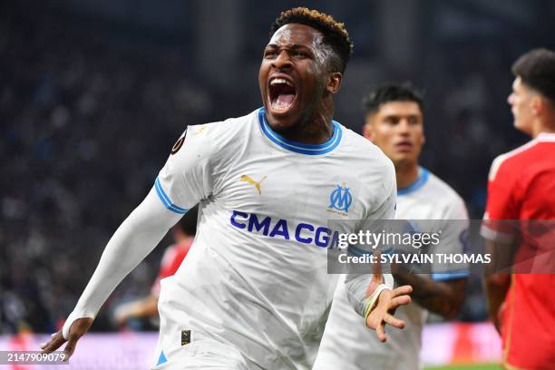 Marseille's Cameroonian forward Faris Moumbagna celebrates scoring his team's first goal during the UEFA Europa League quarter final second leg...