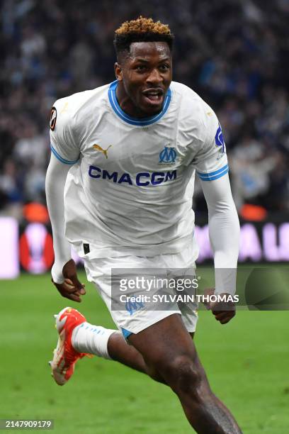 Marseille's Cameroonian forward Faris Moumbagna celebrates scoring his team's first goal during the UEFA Europa League quarter final second leg...