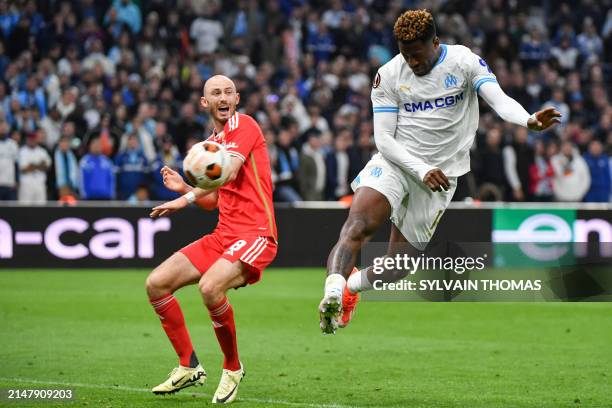 Marseille's Cameroonian forward Faris Moumbagna scores his team's first goal during the UEFA Europa League quarter final second leg football match...