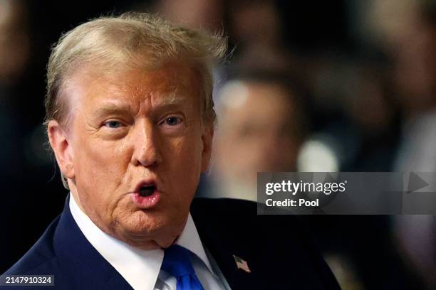 Former US President Donald Trump speaks to the media as he leaves court for the day at Manhattan Criminal Court on April 18, 2024 in New York City....
