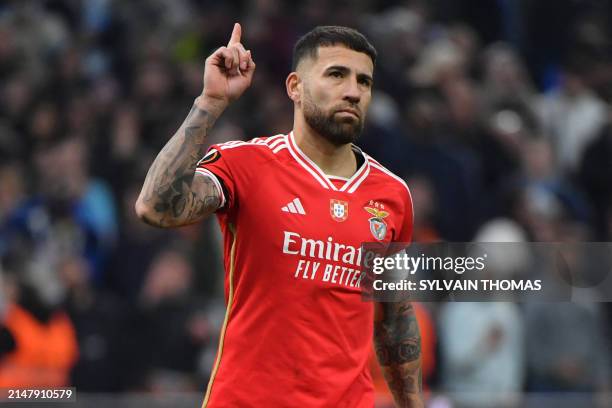 Benfica's Argentinian defender Nicolas Otamendi celebrates after scoring during the penalty shoot out during the UEFA Europa League quarter final...