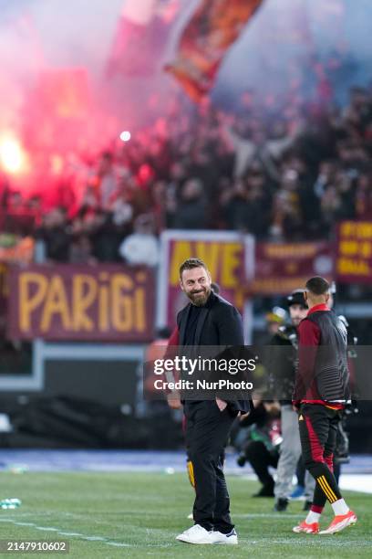 Daniele De Rossi head coach of AS Roma smiles during the UEFA Europa League 2023/24 Quarter-Final second leg match between AS Roma and AC Milan at...