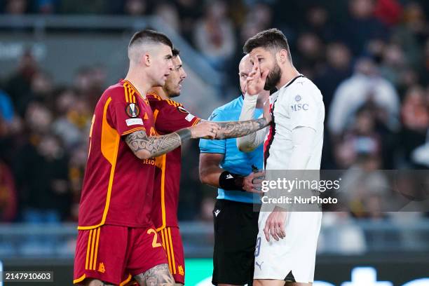 Gianluca Mancini of AS Roma argues with Olivier Giroud of AC Milan during the UEFA Europa League 2023/24 Quarter-Final second leg match between AS...