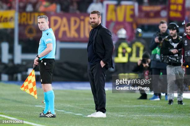 Daniele De Rossi head coach of AS Roma smiles during the UEFA Europa League 2023/24 Quarter-Final second leg match between AS Roma and AC Milan at...