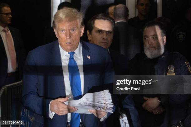 Former U.S. President Donald Trump exits the courtroom following his criminal trial at Manhattan Criminal Court on April 18, 2024 in New York City....