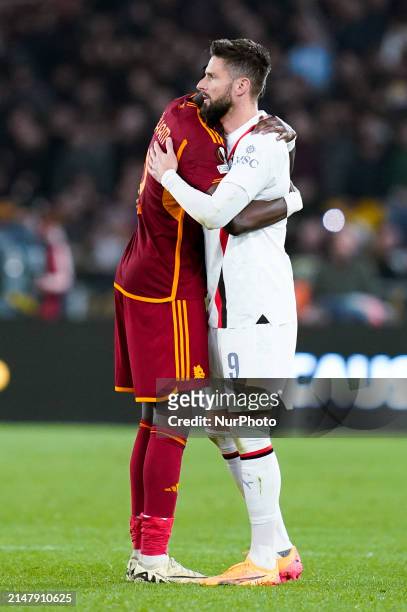Romelu Lukaku of AS Roma consoles Olivier Giroud of AC Milan during the UEFA Europa League 2023/24 Quarter-Final second leg match between AS Roma and...