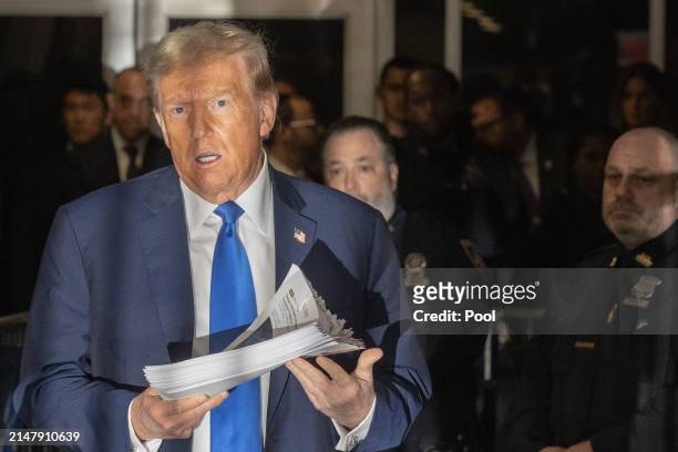 Former U.S. President Donald Trump speaks to members of the media as he departs Manhattan Criminal Court on April 18, 2024 in New York City. On the...