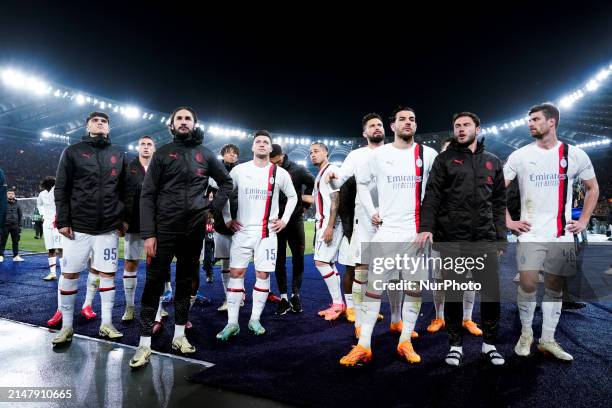 Olivier Giroud of AC Milan and Theo Hernandez of AC Milan and their teammates look dejected at the end of the UEFA Europa League 2023/24...