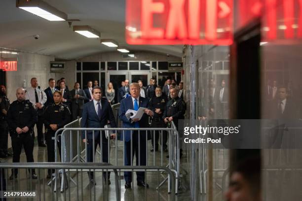 Former U.S. President Donald Trump speaks to members of the media as he departs Manhattan Criminal Court on April 18, 2024 in New York City. On the...