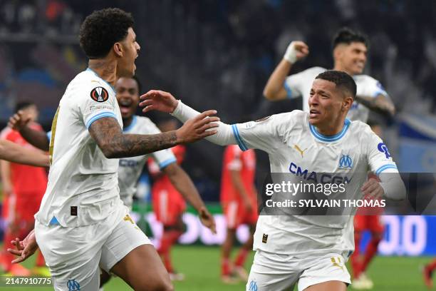 Marseille's Brazilian forward Luis Henrique celebrates with teammates after winning the UEFA Europa League quarter final second leg football match...
