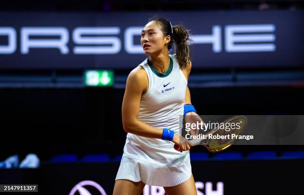 Qinwen Zheng of China in action against Marta Kostyuk of Ukraine in the second round on Day Four of the Porsche Tennis Grand Prix Stuttgart 2024 at...
