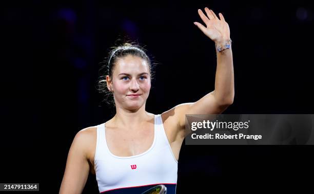 Marta Kostyuk of Ukraine celebrates defeating Qinwen Zheng of China in the second round on Day Four of the Porsche Tennis Grand Prix Stuttgart 2024...