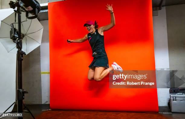 Iga Swiatek of Poland during a photo shoot after defeating Elise Mertens of Belgium in the second round on Day Four of the Porsche Tennis Grand Prix...