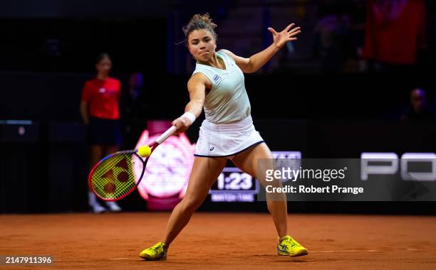 Jasmine Paolini of Italy in action against Ons Jabeur of Tunisia in the second round on Day Four of the Porsche Tennis Grand Prix Stuttgart 2024 at...