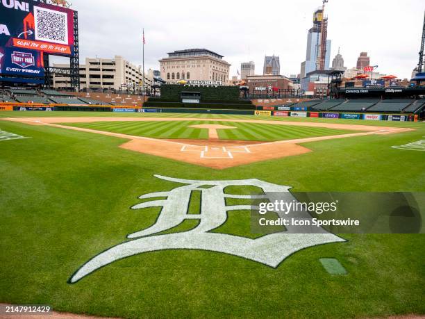 The Detroit Tigers logo is pictured on the field before a regular season Major League Baseball game between the Texas Rangers and the Detroit Tigers...