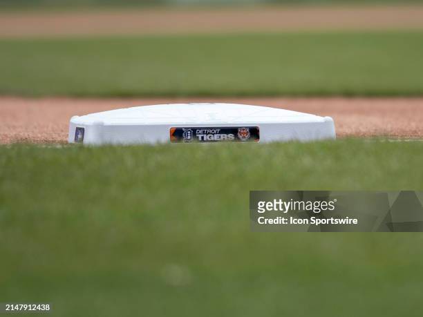 The Detroit Tigers logo is pictured on third base before a regular season Major League Baseball game between the Texas Rangers and the Detroit Tigers...