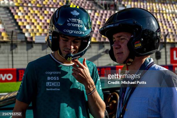 Aston Martin Pirelli Hot Laps activity. Lance Stroll, Aston Martin F1 Team, gives Craig Slater from Sky a ride during previews ahead of the F1 Grand...