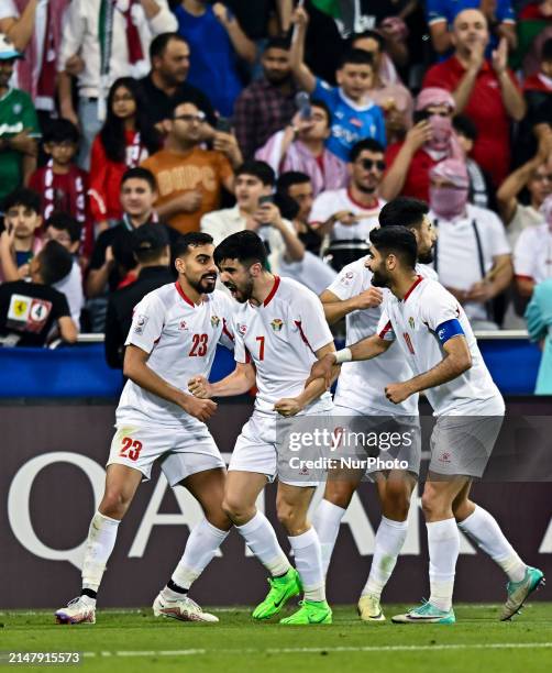 Aref Haitham of Jordan is celebrating after scoring a goal during the AFC U23 Asian Cup Qatar 2024 Group A match between Qatar and Jordan at Jassim...