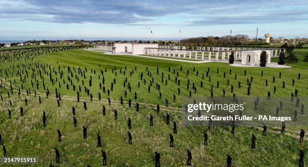 View of the Standing with Giants silhouettes which create the For Your Tomorrow installation at the British Normandy Memorial, in Ver-Sur-Mer,...